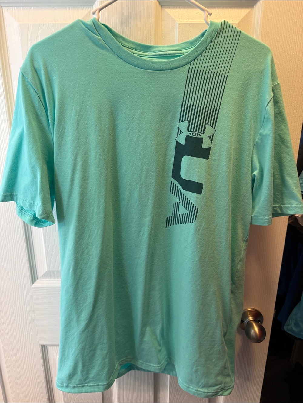 Under Armour Men’s Short Sleeve Tee in Aqua Mint with Navy Logo - Picture 1 of 3
